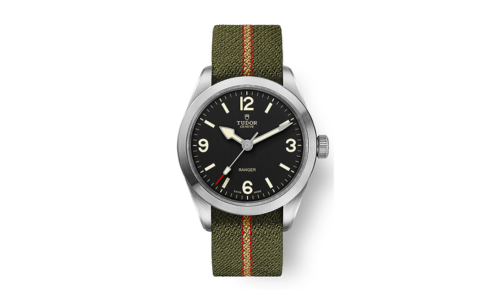 A TUDOR Ranger watch with a green fabric strap, available at La Différence Time Centre.