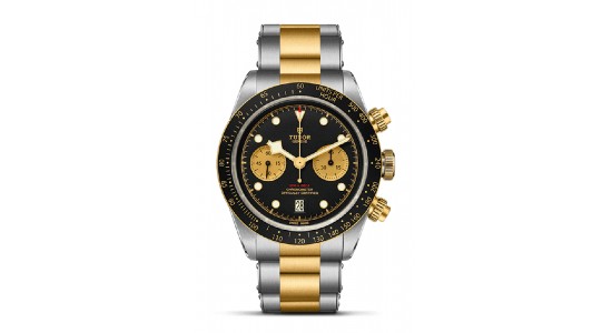 A mixed metal TUDOR Chronograph watch with a black dial, available at La Différence Time Centre.