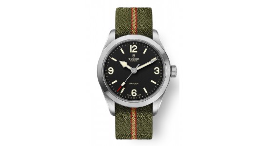A stainless steel TUDOR Ranger watch with green strap, available at La Différence Time Centre.